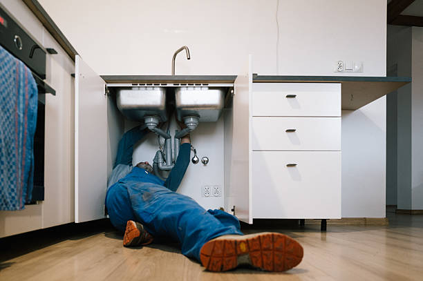 Professional Drain Cleaning technician working in Warrenton, MO